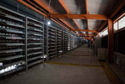 Large-scale mining farm hosting diverse cryptocurrency miners